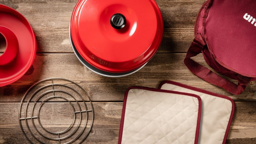 Omnia oven with rack and pot holders